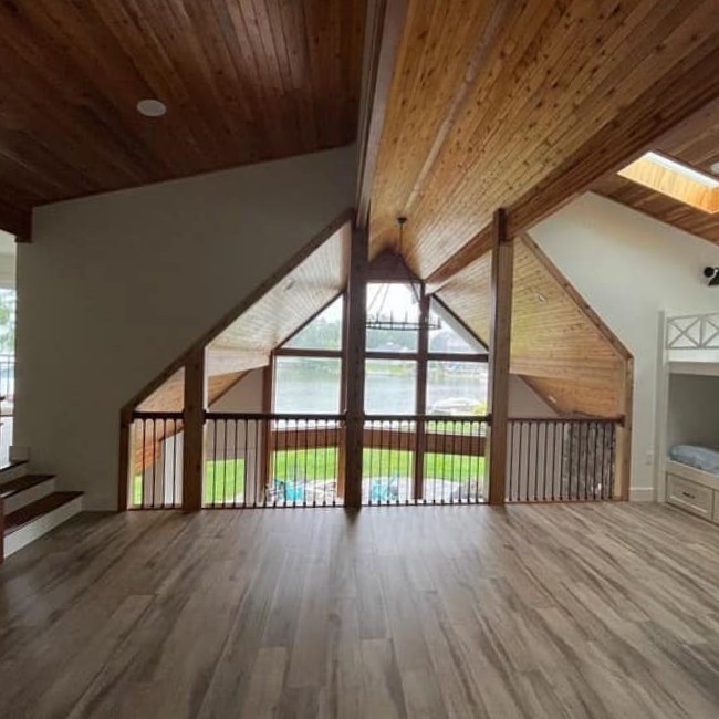room with wooden floors and beams